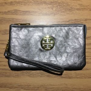 Shimmery gray Tory Burch wristlet